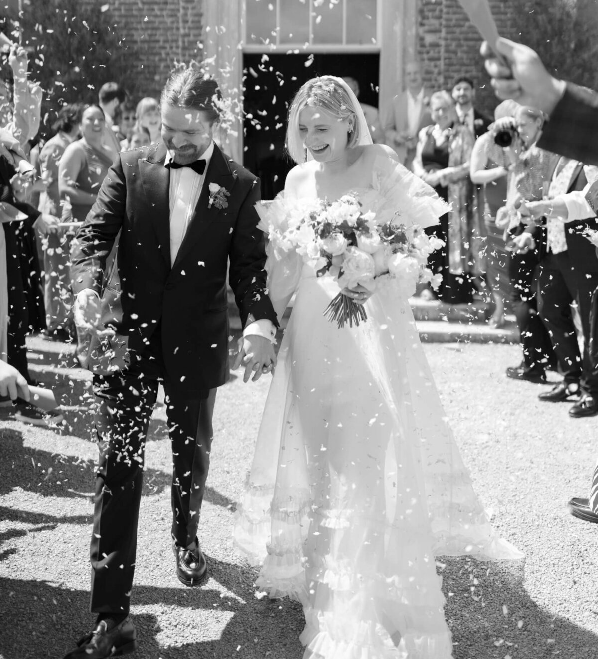 Wedding Trends of 2023, real petal confetti. Confetti shot outside St Giles House on North Drawing Room Terrace.