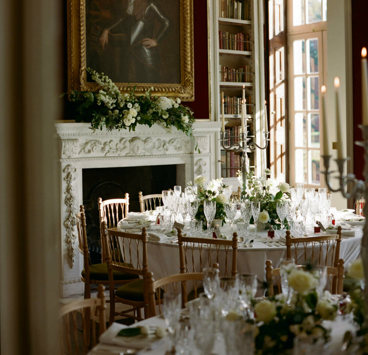 Taylor and Porter Photography Wedding Breakfast Room with Round Tables In The Library