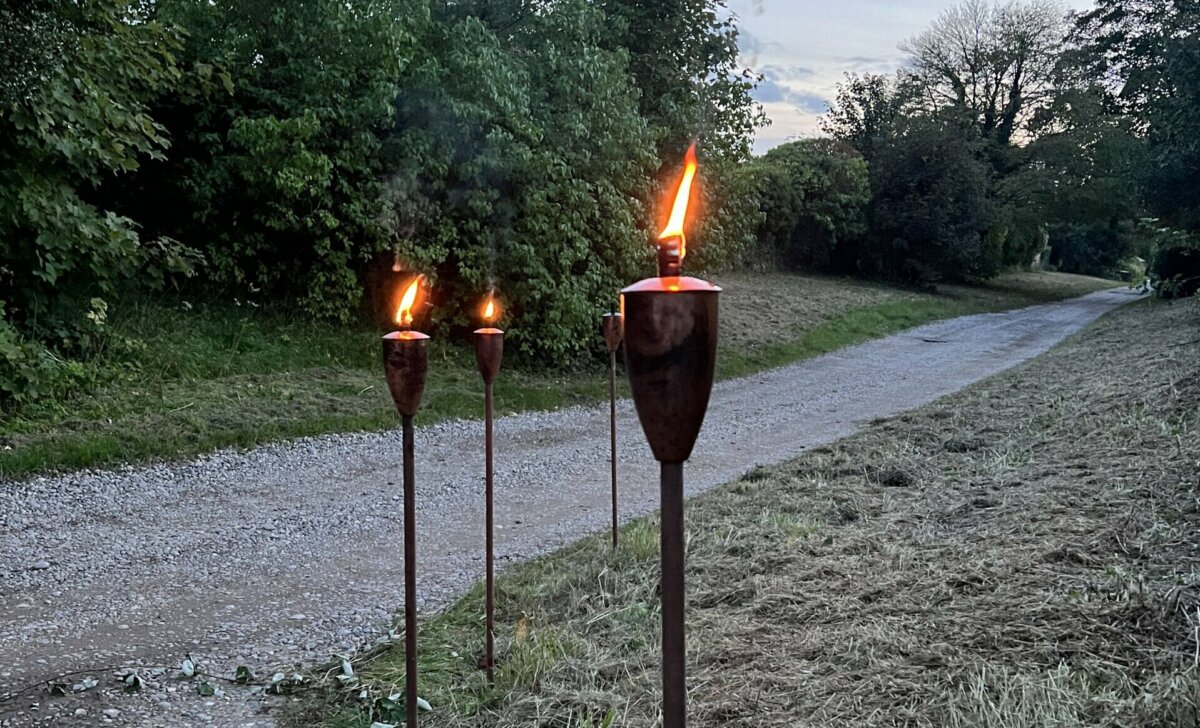 Tiki Torches to line the path to The Forestry Bar on Wimborne St Giles